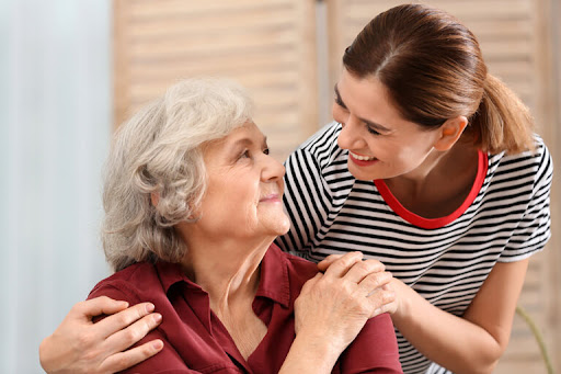 alzheimers caregiver with senior woman